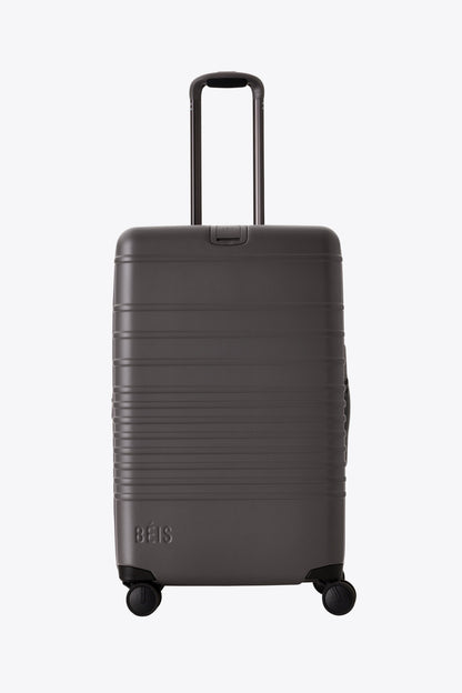 The Medium Check-In Roller in Charcoal