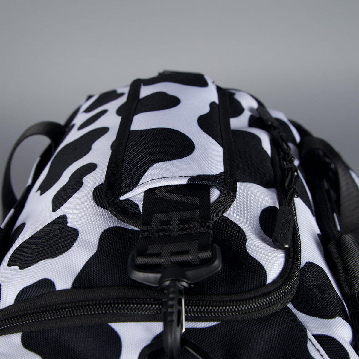 20L Mini Duffle Bag Black White Cow - Image 28